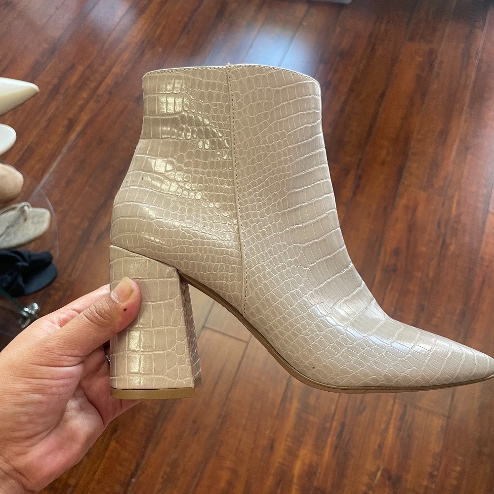 Express snakeskin booties